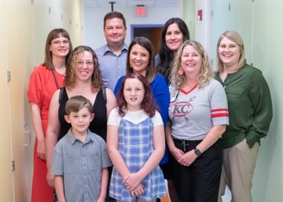 Hailey surrounded by her strong support system, including her mother, little brother and care team from Children's Mercy.