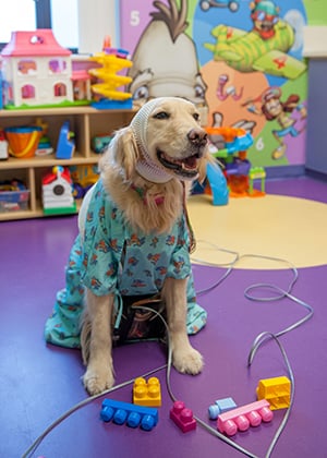 Hope plays in the playroom in the EMU at Children's Mercy.